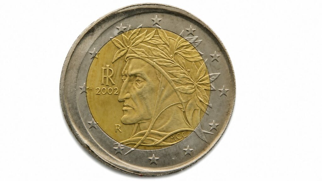 Pièce de 2 euros à frappe décentrée dont une partie du flan est restée vierge
